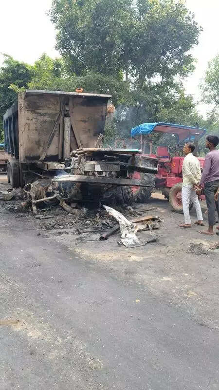 Three burnt alive as mini truck, dumper catch fire after crash