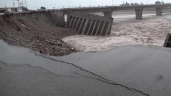 Incessant rains batter J&K: Road connecting Tawi Bridge washes away as river swells, flows in spate - watch