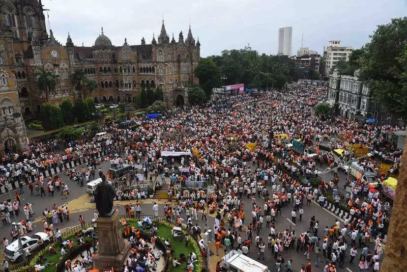 Jarange protest in Mumbai: Thousands make home on footpaths & lanes, cook amid heavy downpour; traffic hit, events cancelled
