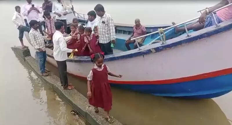 Children take boat ride across Krishna to demand for teachers at island school in Telangana