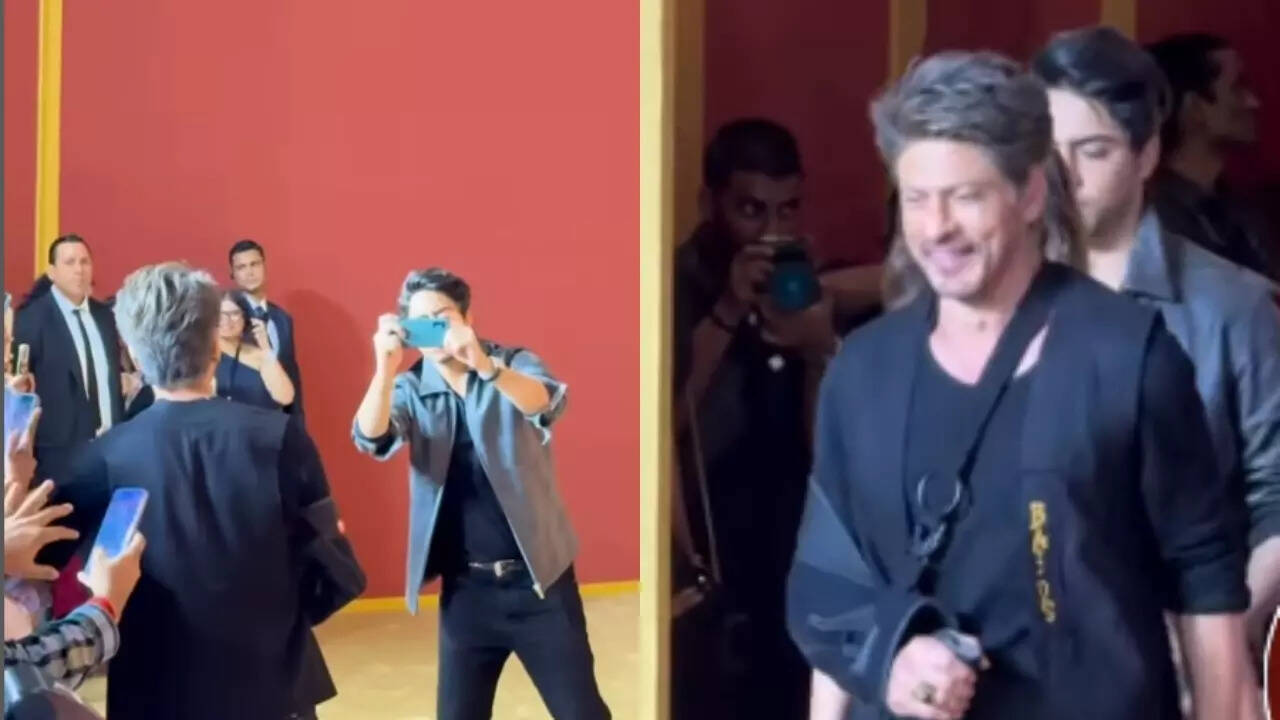 SRK burys hatchet with the paps, poses with them, Aryan clicks