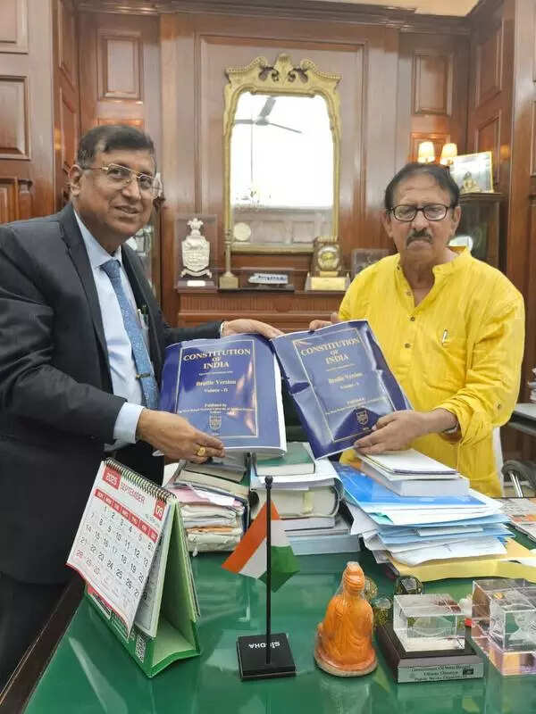 NUJS presents Braille Constitution to Speaker