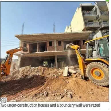 350 shanties, illegal building razed in colony along Golf Course Road in Gurgaon