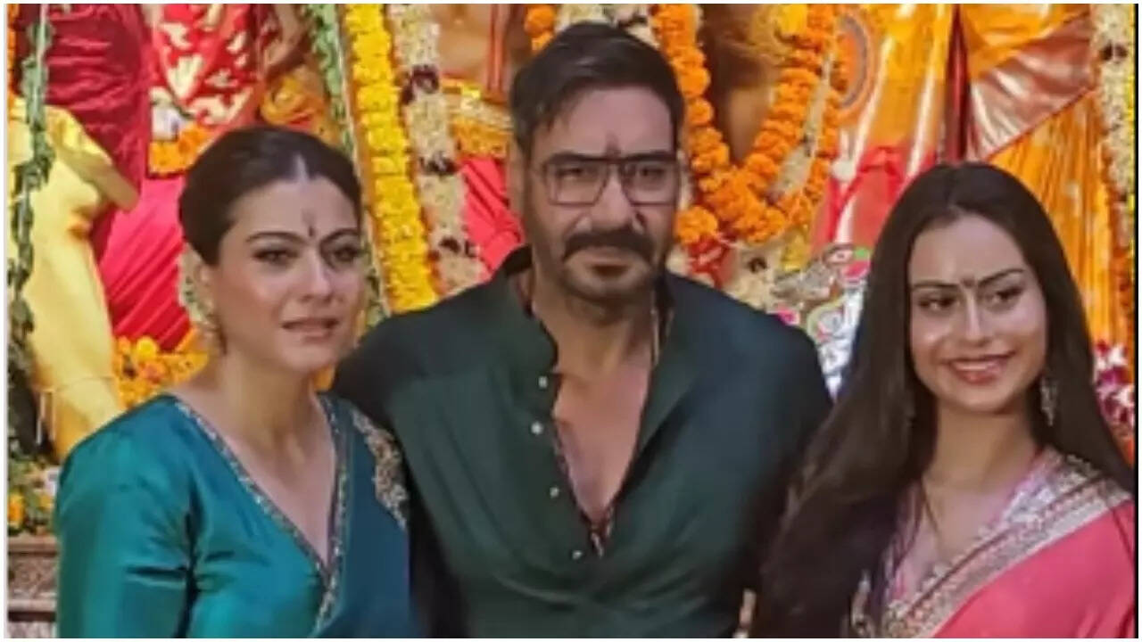 Ajay spotted with Kajol and Nysa at Durga Puja