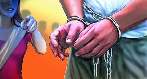 Man held for assaulting woman outside tea shop