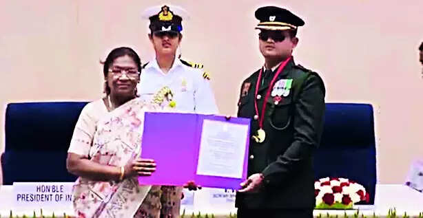 Country’s first blind Army officer in active service shoots to national award