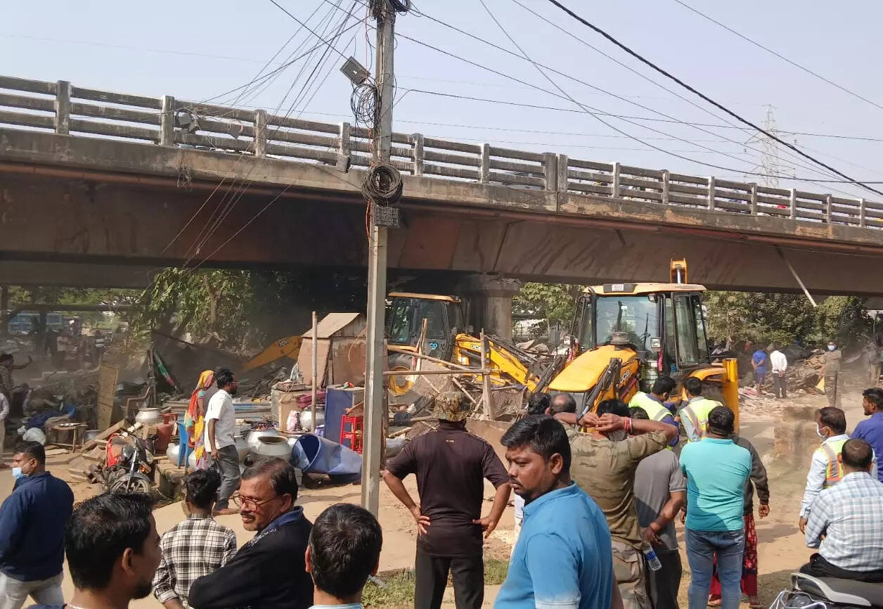 NHAI removes slum under Palasuni bridge to build third bridge on NH-16