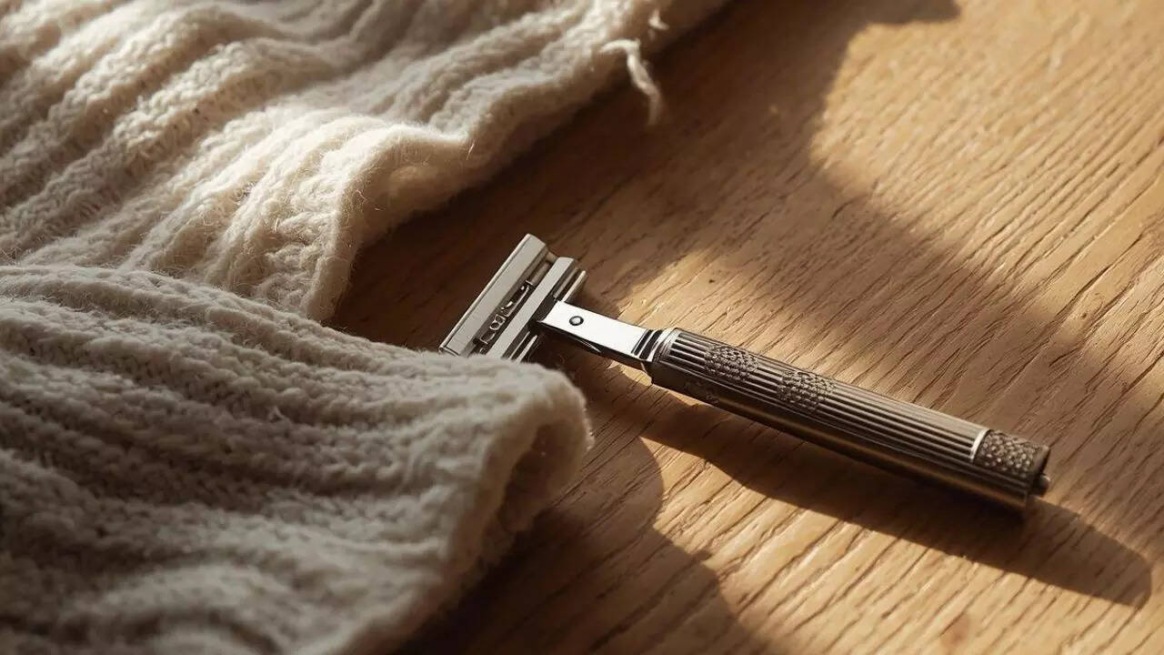 How to make a sweater look new again using JUST a disposable razor