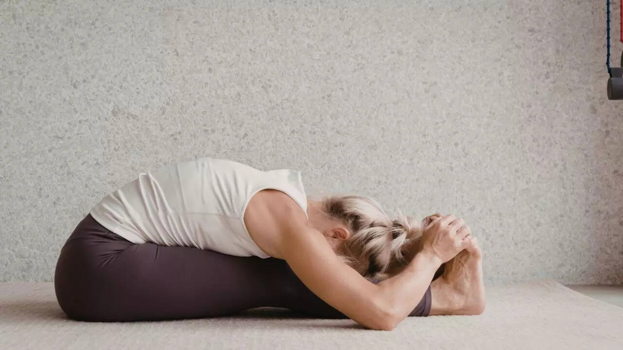 Hastapadasana (Standing Forward Bend)