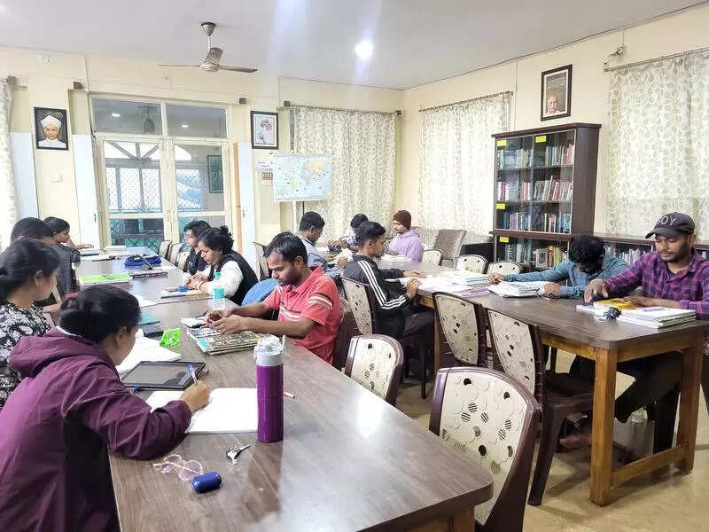 Retd IFS officer sets up free library, teaches students in Puri