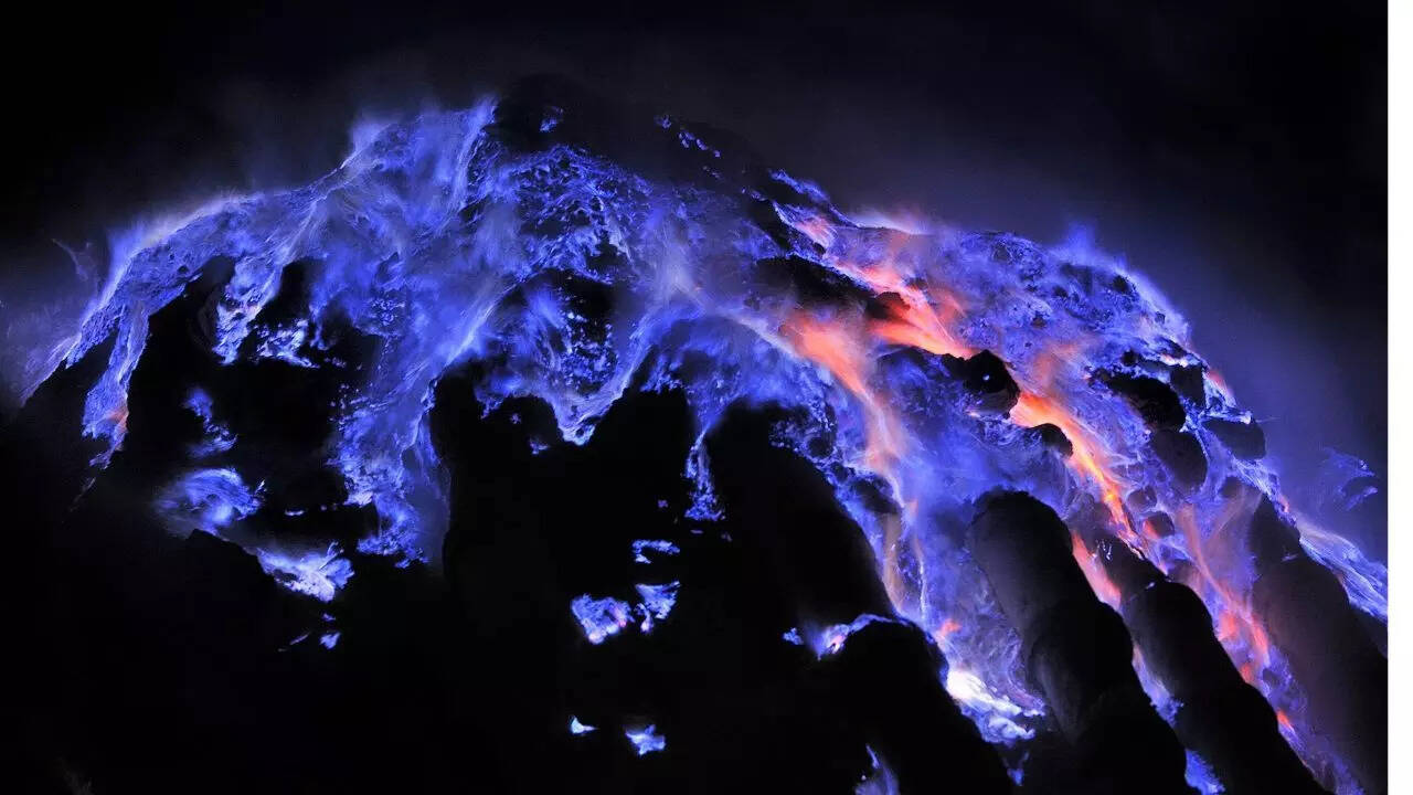 Why this volcano glows electric blue instead of red lava