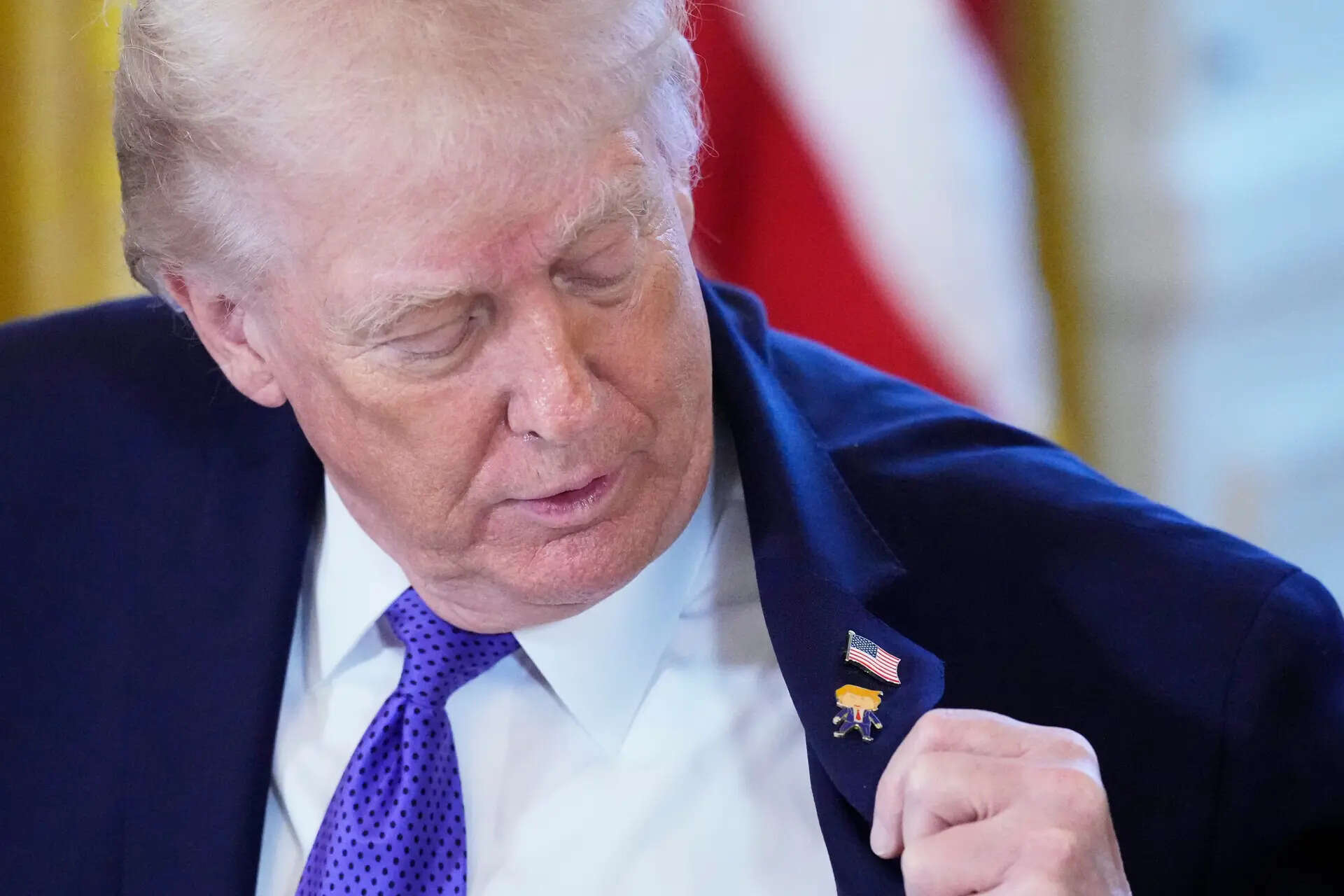 ‘Happy Trump’: Trump wears own lapel pin for meeting on Venezuelan oil