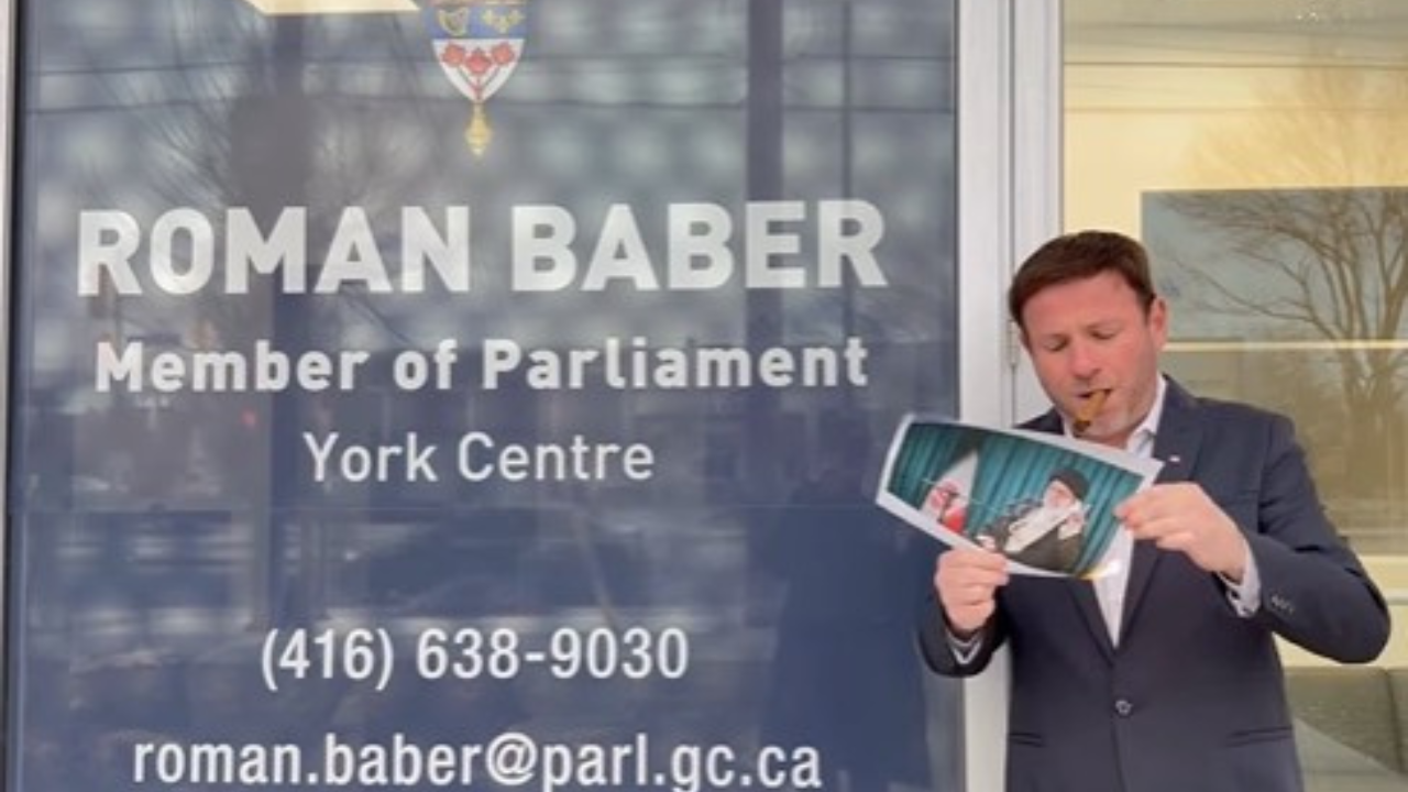 Canada MP joins viral Iran protest trend, lights cigar with burning portrait of Khamenei