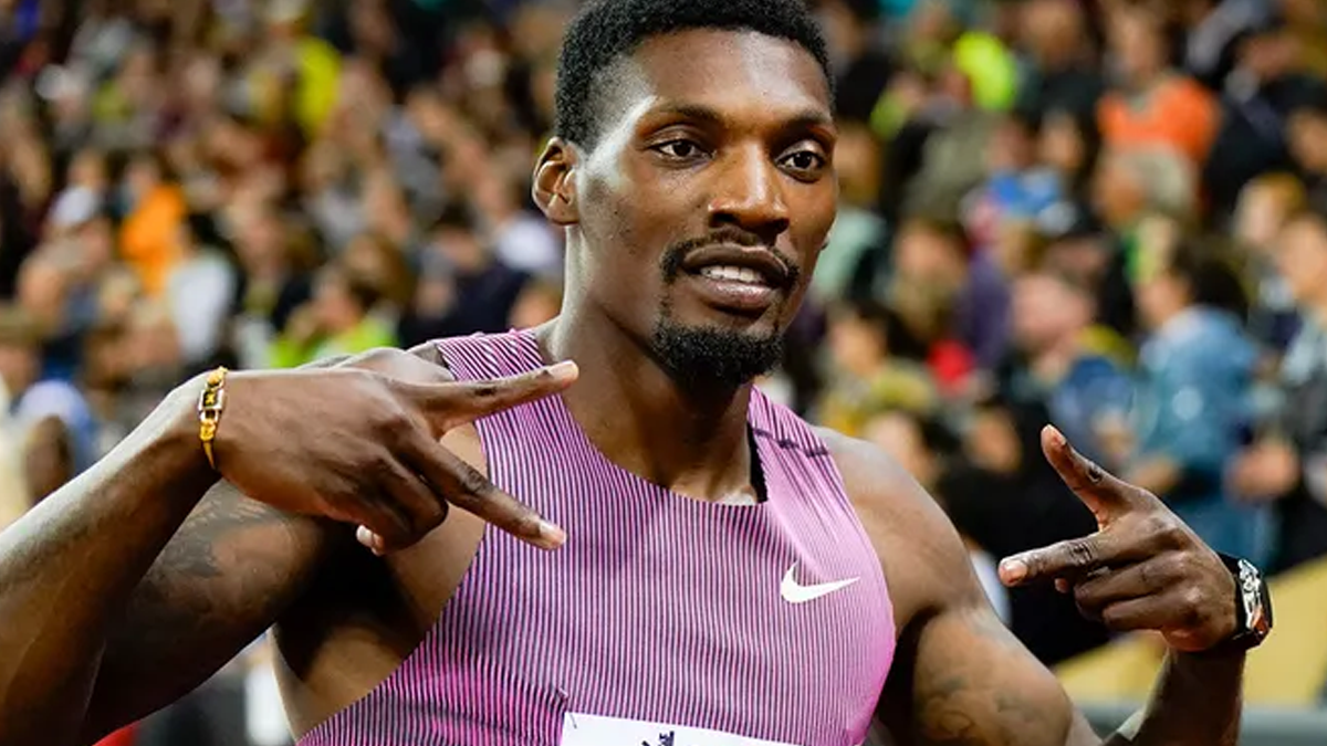 Fred Kerley celebrates with attorneys after resolving major legal troubles