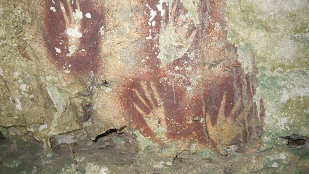 Scientists discovered mysterious cave handprint that could be the oldest rock art ever found