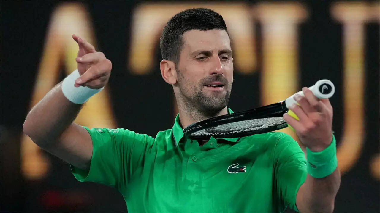 Djokovic into quarter-finals after Mensik withdraws