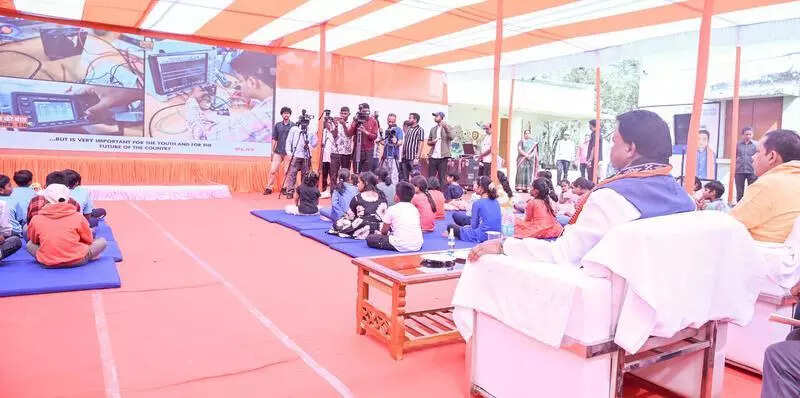 CM joins students to listen to PM’s ‘Mann Ki Baat’ in school
