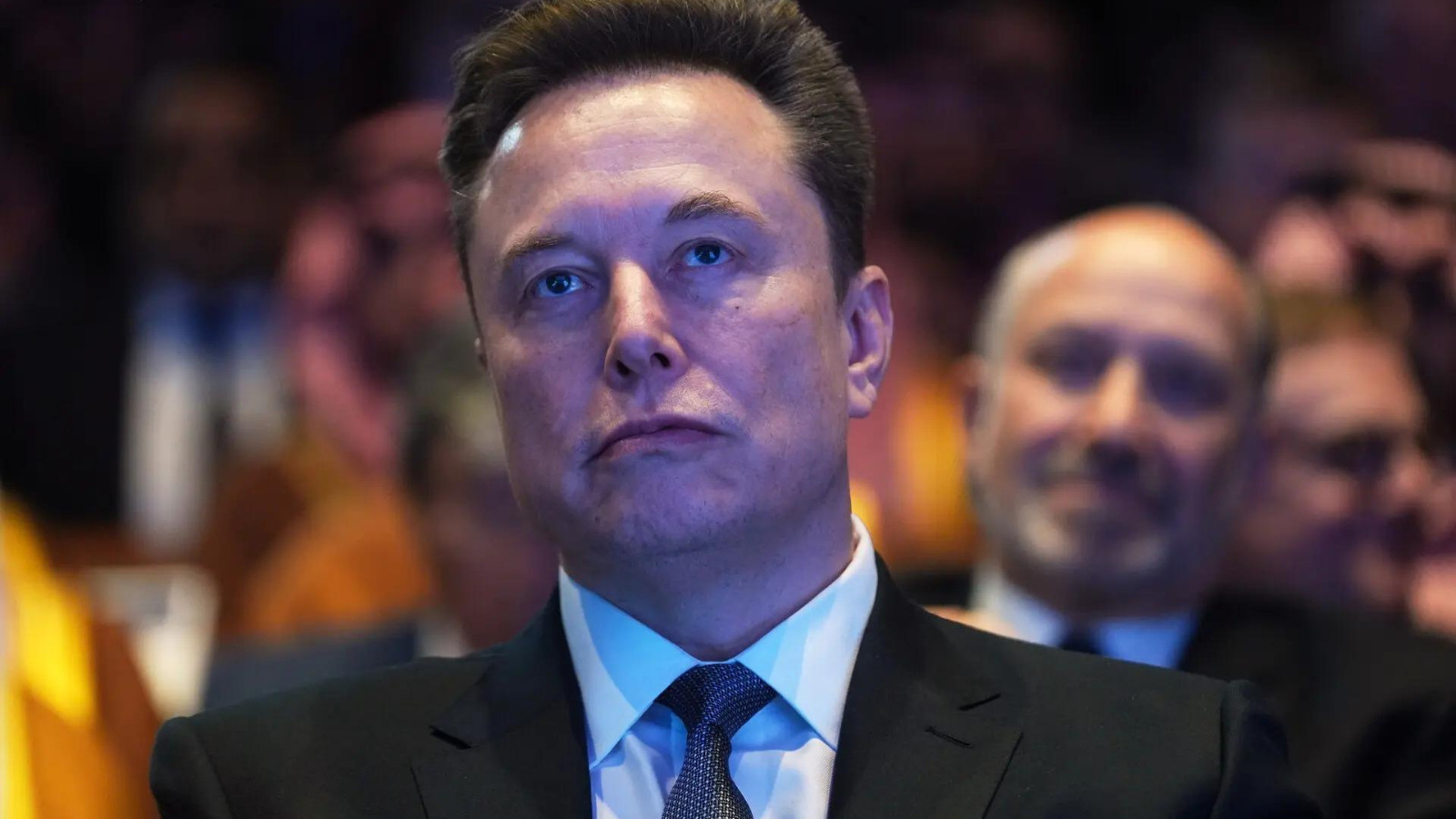What did Elon Musk warn American companies about at Tesla’s earnings call?