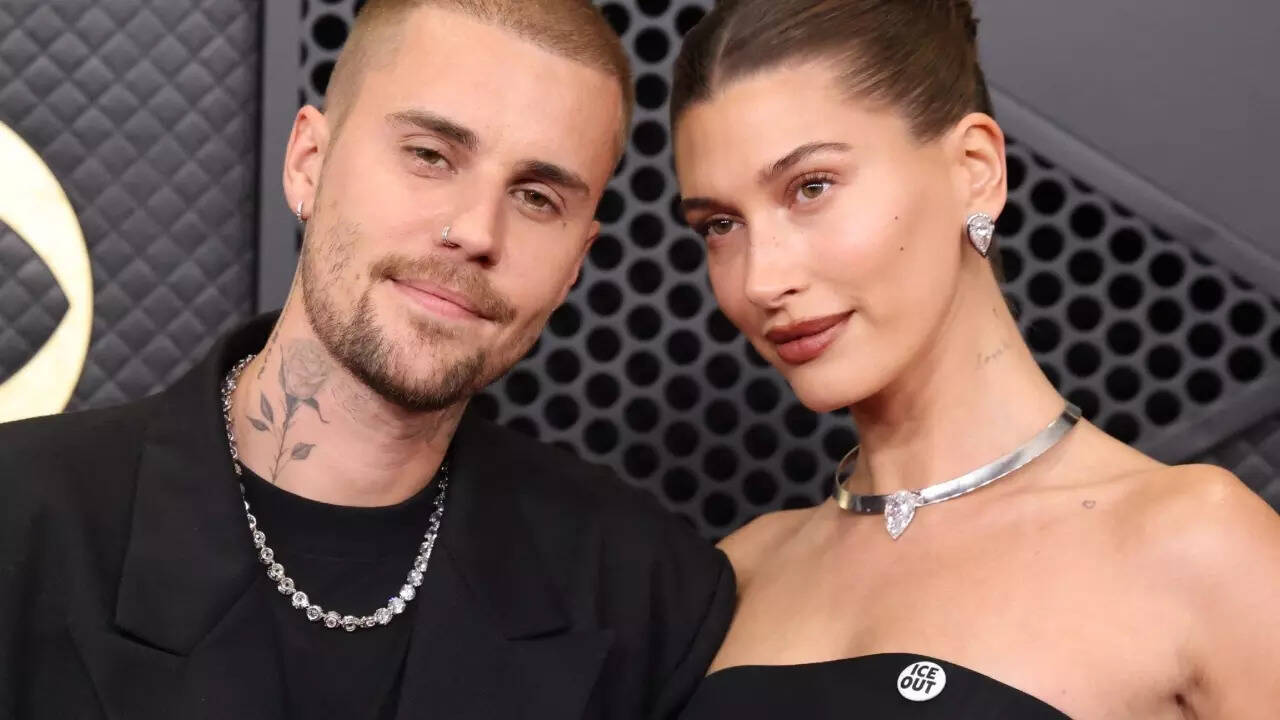 Justin-Hailey twin in black; wear ICE OUT pins