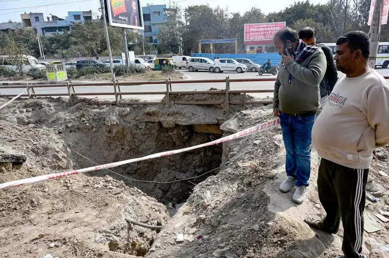 Quick Fix On Dwarka Road As Pit Lies Ignored On Other Side