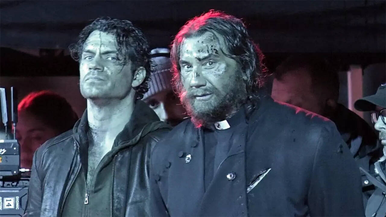 Cavill and Bautista crash cars in Highlander