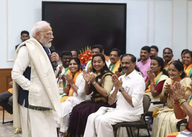 PM Modi hosts BJP councillors from Kerala at home