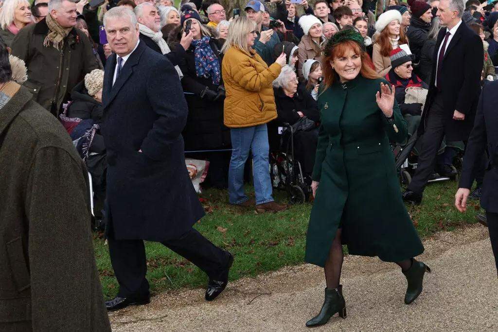 Prince Andrew walked to the church in navy along with Sarah, Duchess of York, who made a surprise appearance in an emerald ensemble.