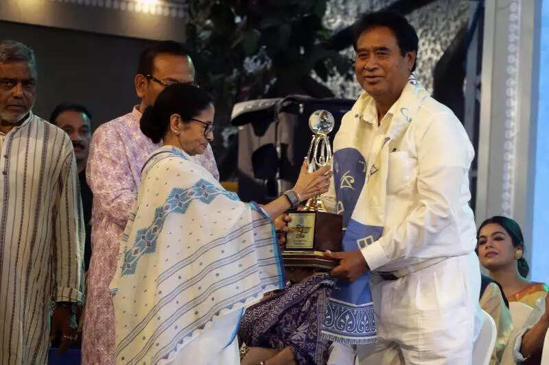 Mamata confers Bangabibhushan award on BJP MP Ananta Maharaj
