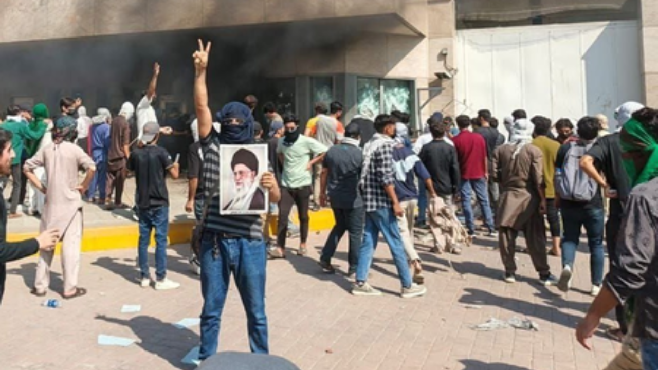Watch: Hundreds storm US Consulate in Karachi after Khamenei’s death; several injured