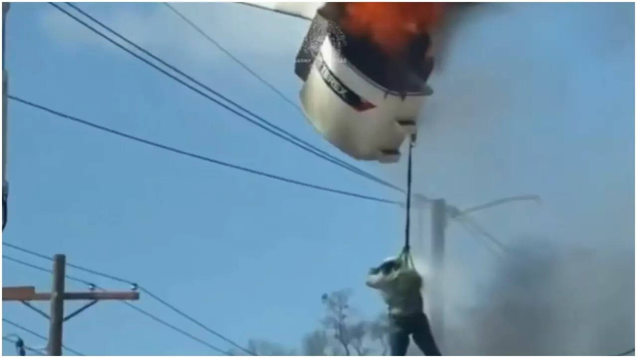 Watch: Louisiana worker dangling from fiery cherry picker before plunging to ground