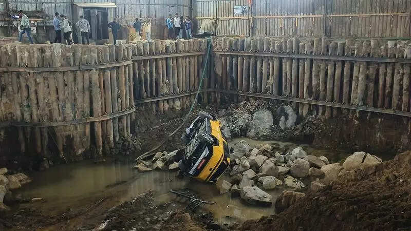 Test drive SUV crashes into auto, 2 bikes &amp; plunges into construction pit, 3 hurt