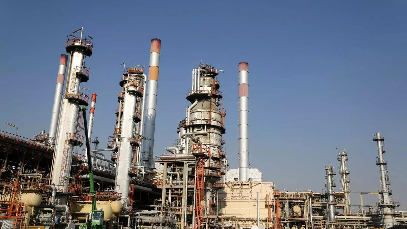 Day after 3-year high, global oil prices cool to below $90 per barrel