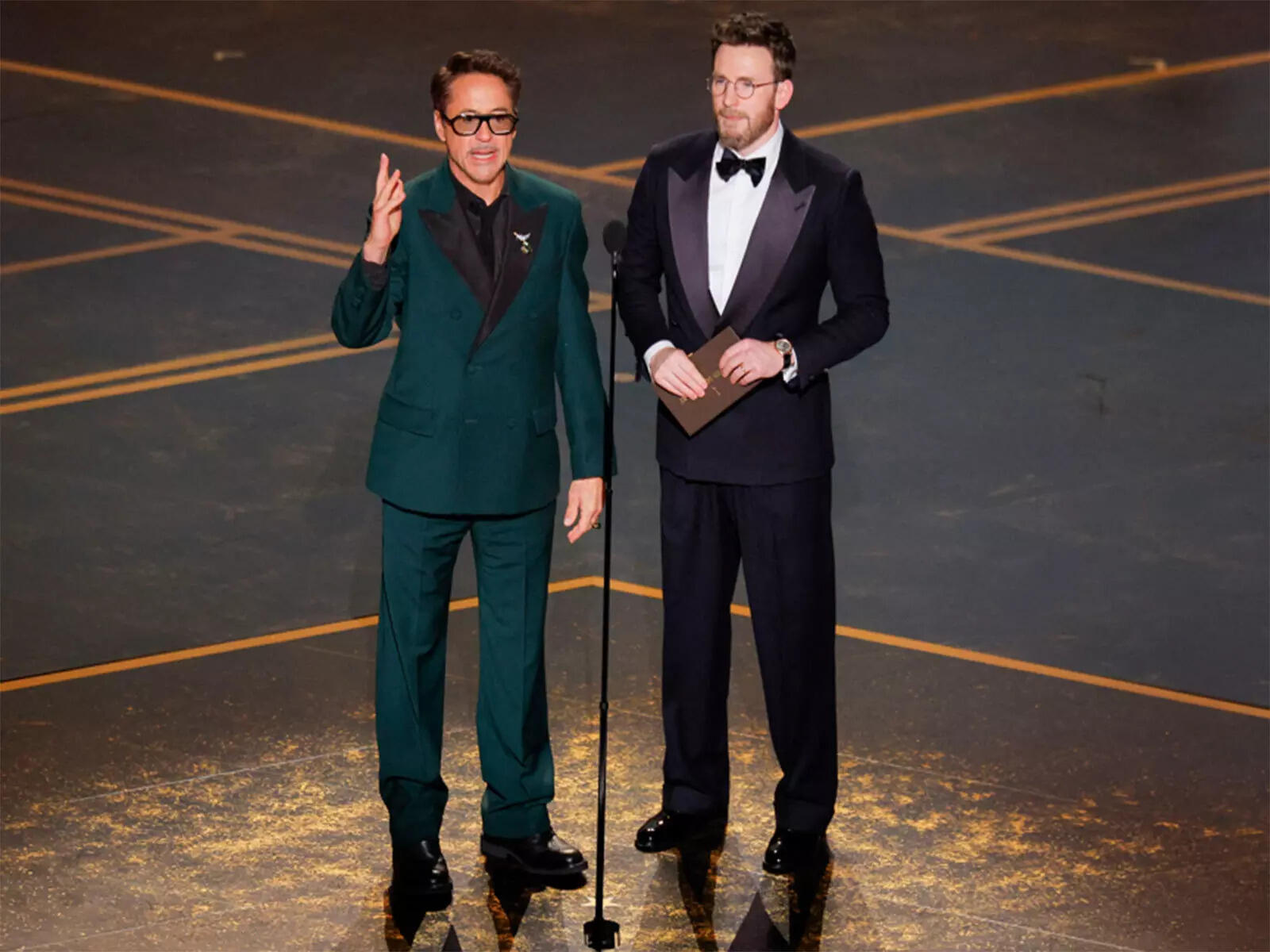 Robert Downey Jr Chris Evans Oscars Reunion Stuns Fans