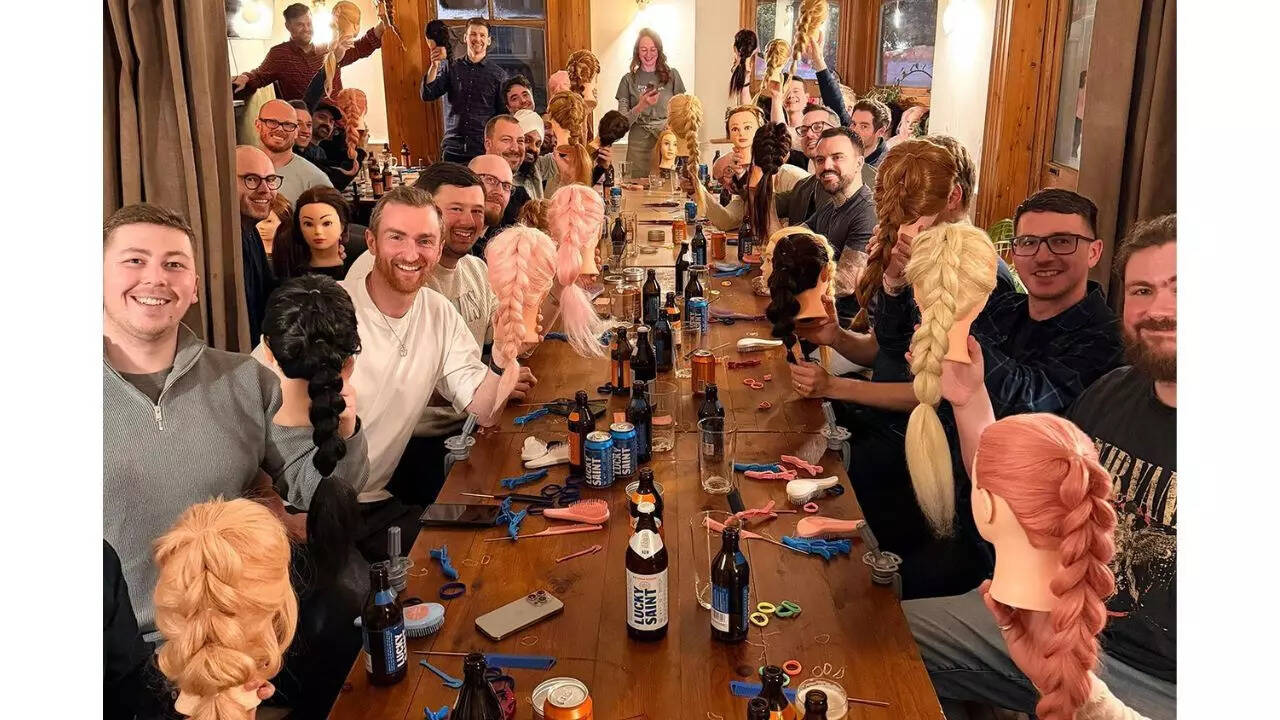‘Pints & Ponytails’: London dads gather in pub to learn how to braid their daughters’ hair
