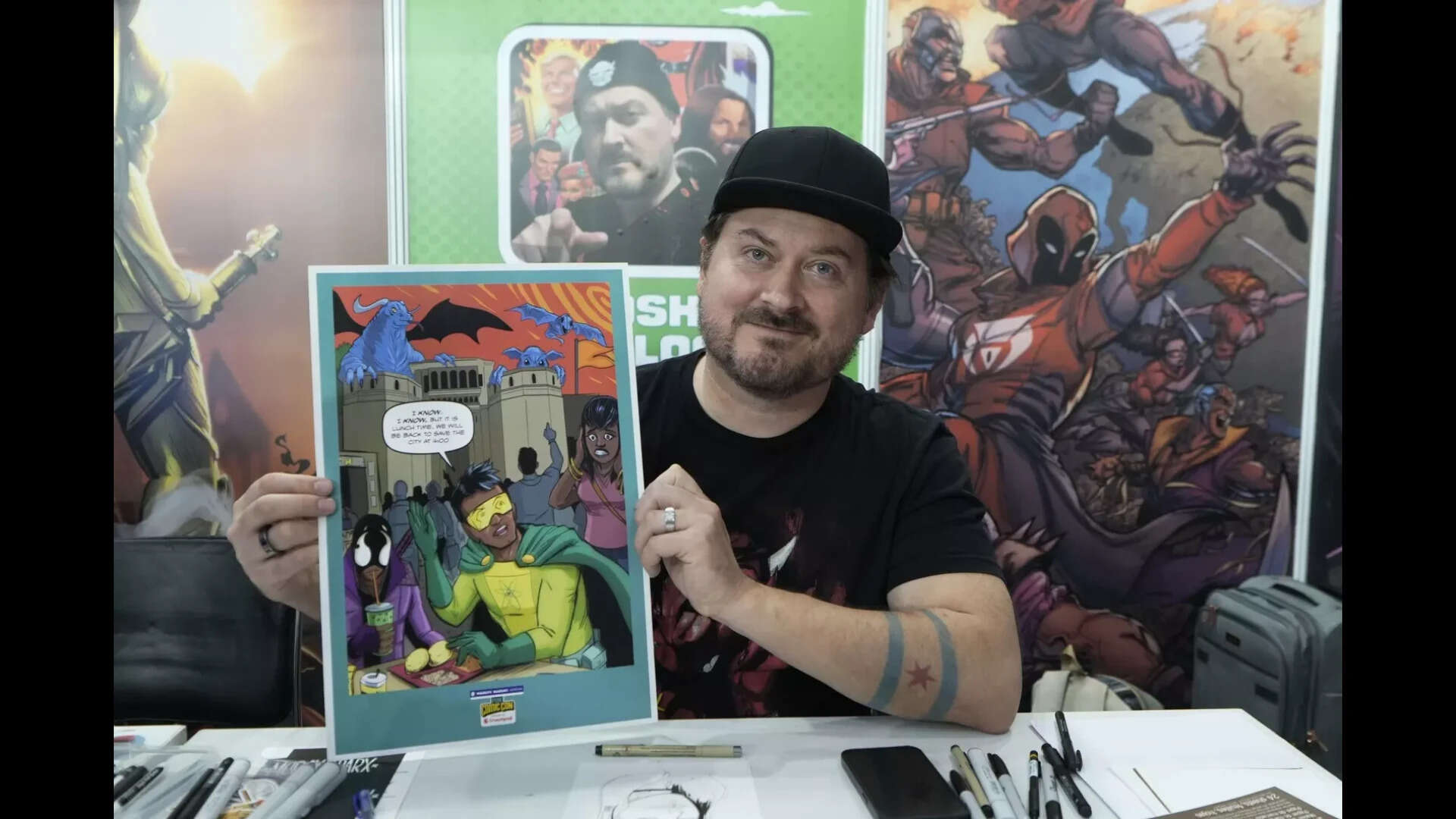 International guest Josh Blaylock showing his artwork at Pune Comic Con