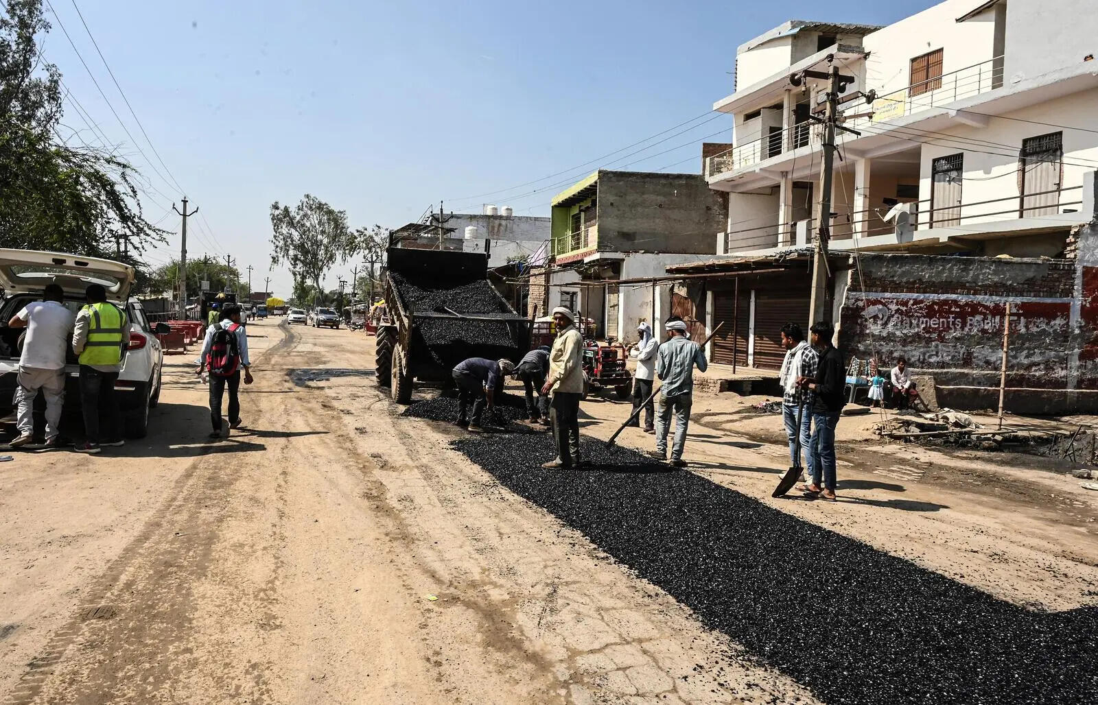 Road repairs, installation of hoardings, and tents near Noida International Airport are underway as the inauguration approaches. Officials are busy giving final touches to preparations, including fixing roads, putting up large hoardings, and completing remaining works at the airport.