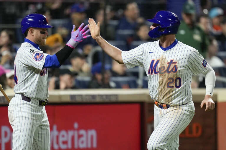 New York Mets Pete Alonso (right) greets Harrison Bader in 2024