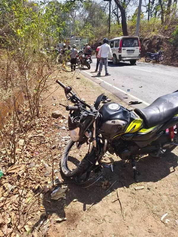 Man dies after van hits bike on potholed road