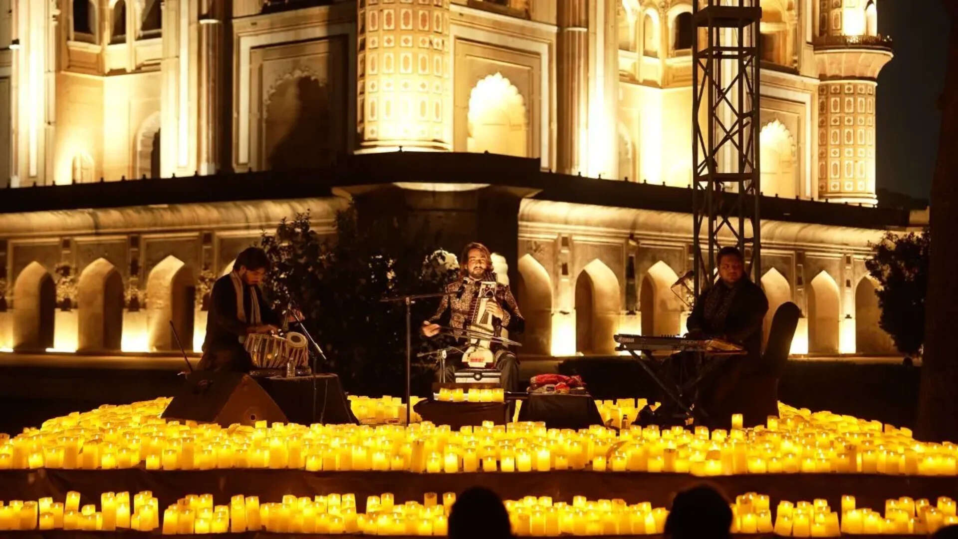 The evening came alive with classical devotional melodies that resonated through the stone archways and open night air The evening came alive with classical devotional melodies that resonated through the stone archways and open night air