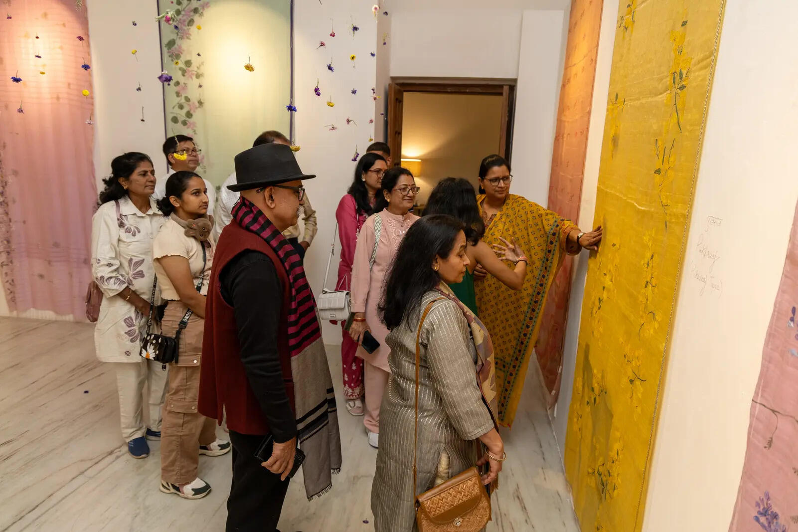 The display featured hand-painted and embroidered sarees that moved beyond clothing into artistic expression. Sharma’s process is guided by feeling. She works closely with material, colour and texture, allowing each piece to develop gradually.