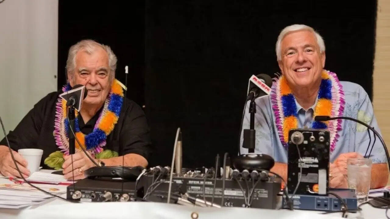 In the studio setup, Price is seated on the left, while Perry sits on the right