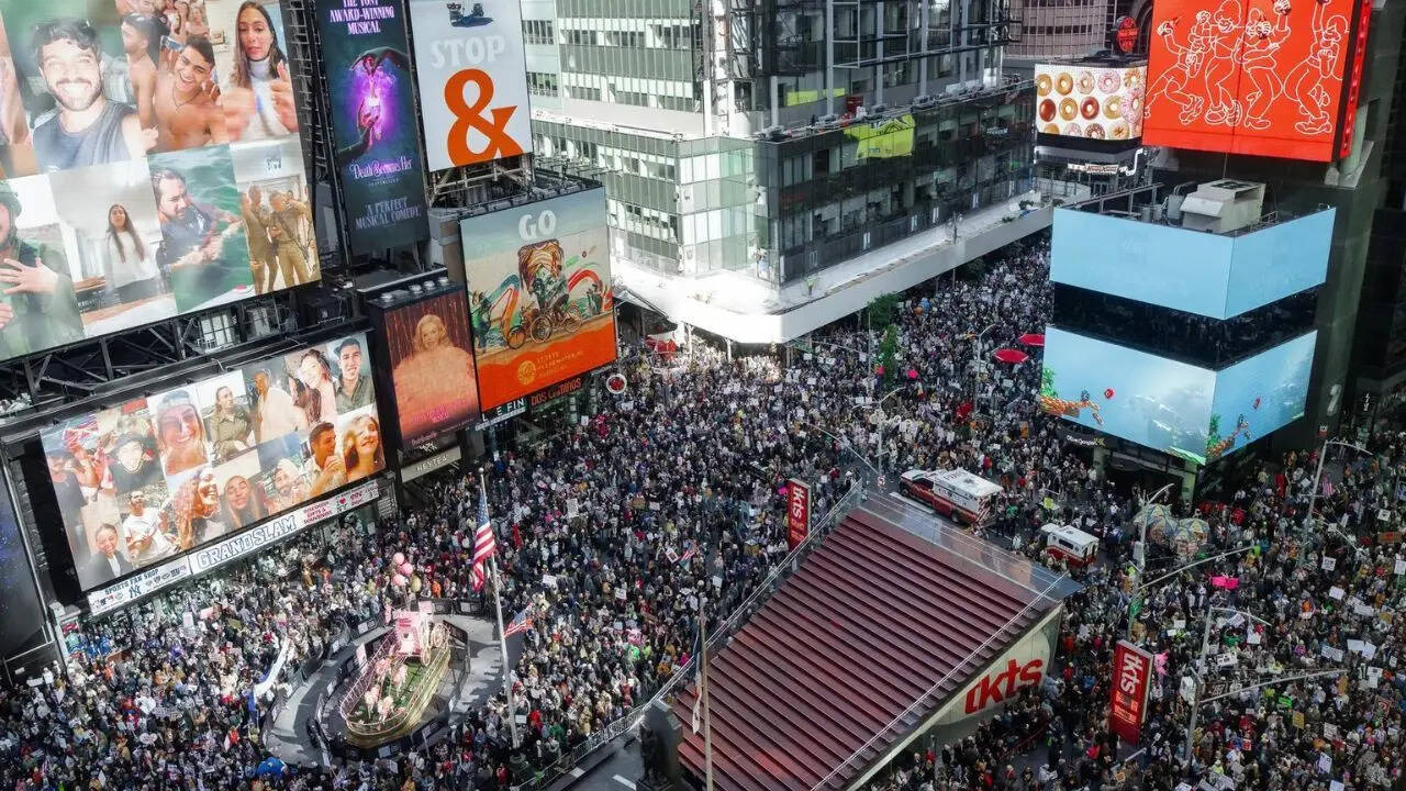 ‘Put down the crown, clown’: Thousands rally against Trump in ‘No Kings’ protestss