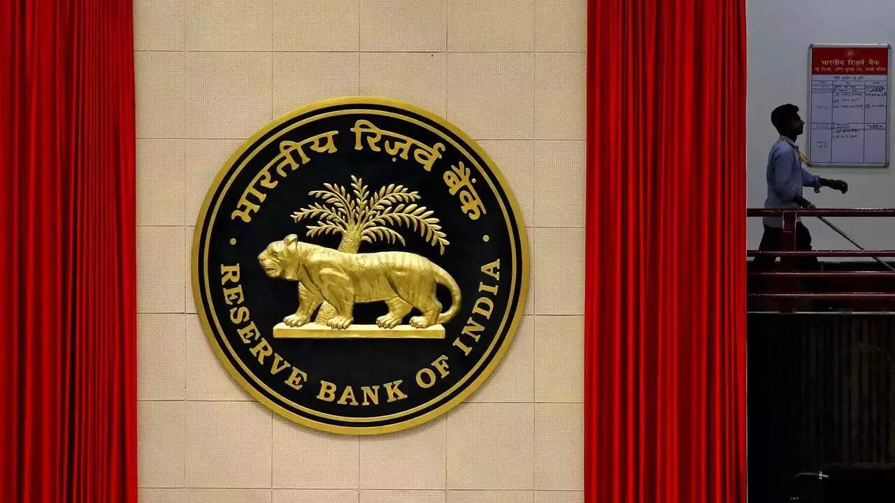 RBI’s forced dollar unwind to keep rupee from sliding, bruise banks