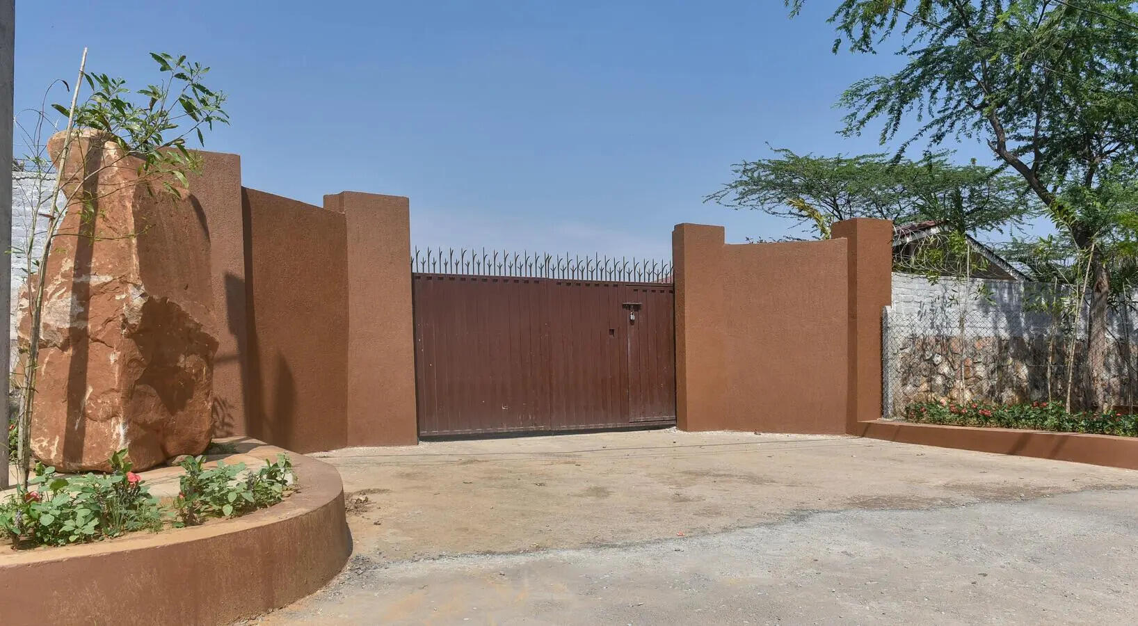 Fresh commercial activity continues inside a protected stretch of the Aravali hills in Sohna