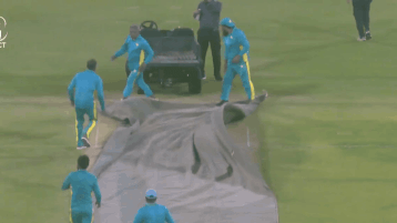 Chaos at Gaddafi Stadium: PSL ground staff slip, fall as covers fly in Lahore—Watch