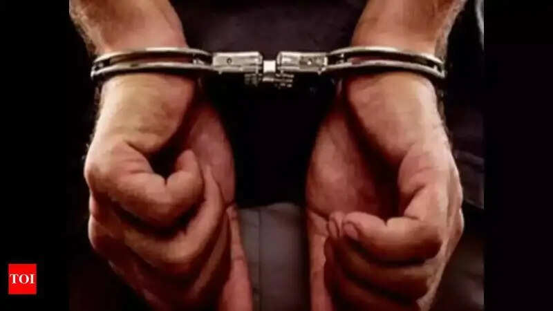 Father arrested, absconding son booked in extortion case