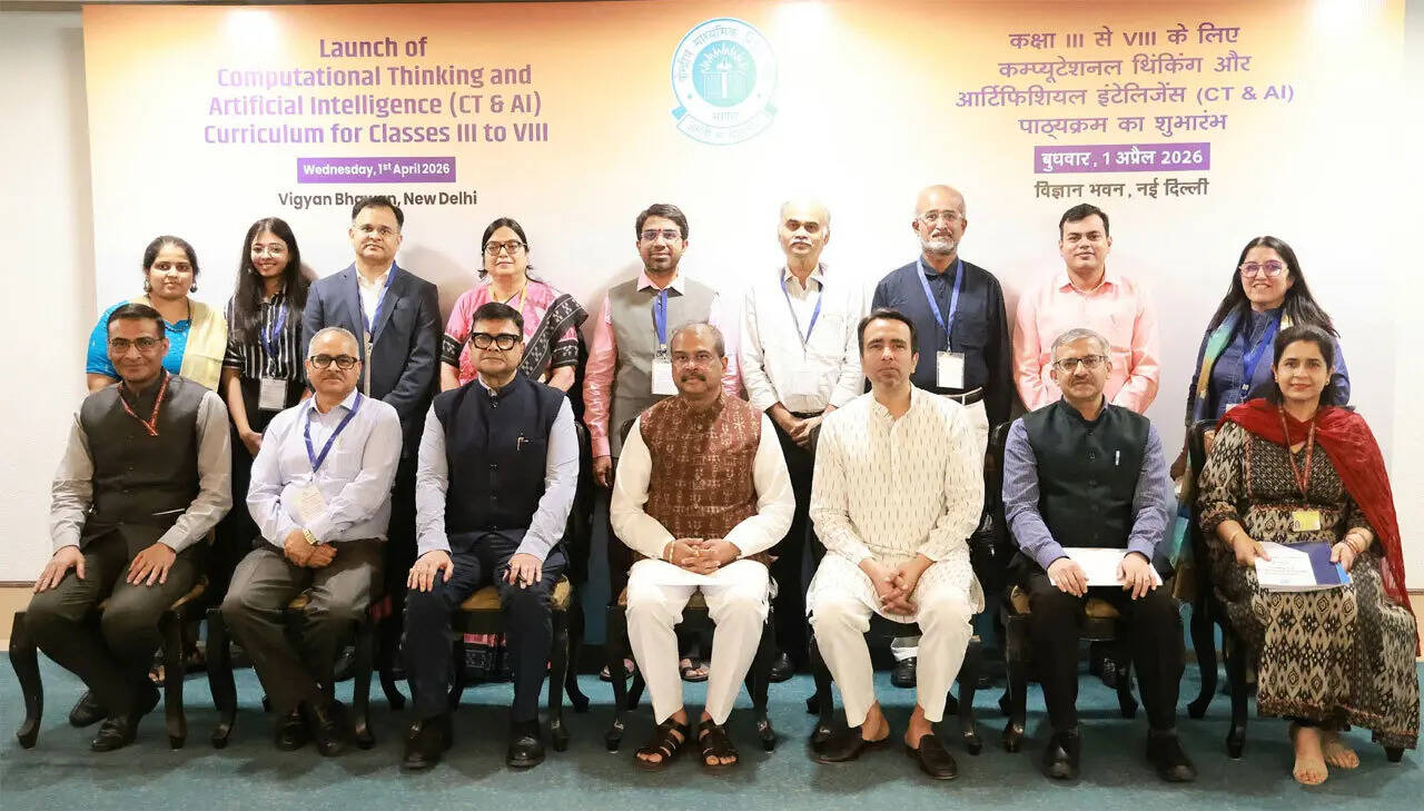 Union Education Minister Dharmendra Pradhan poses with the CBSE CT & AI curriculum development team and dignitaries including Shri Jayant Chaudhary, Sanjay Kumar IAS, Dr Vineet Joshi IAS, Rahul Singh IAS, Dr Dinesh Prasad Saklani, and Ms Prachi Pandey at Vigyan Bhawan, New Delhi, celebrating the launch of the Computational Thinking and Artificial Intelligence syllabus for Classes III to VIII. CBSE CT & AI curriculum development team