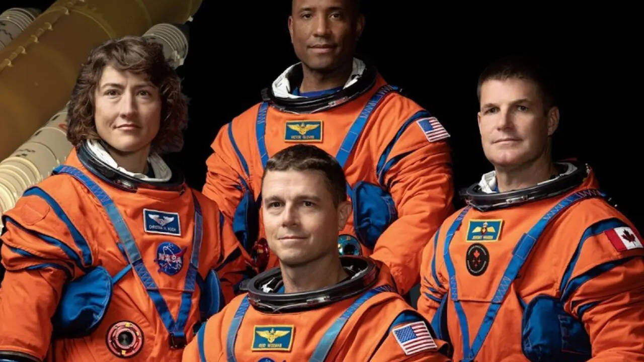 Why NASA’s Artemis II astronauts are wearing bright orange spacesuits on this historic mission