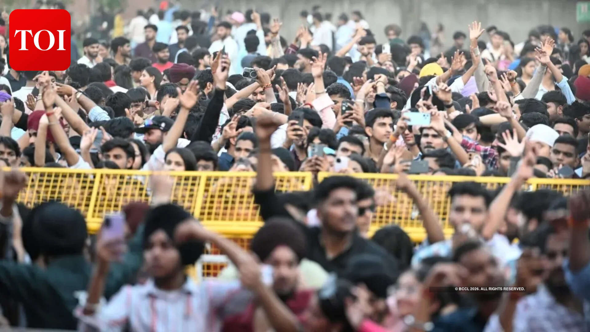 Organisers signalled to the artist to halt the show as the crowd swelled and began breaching barricades to get near the stage