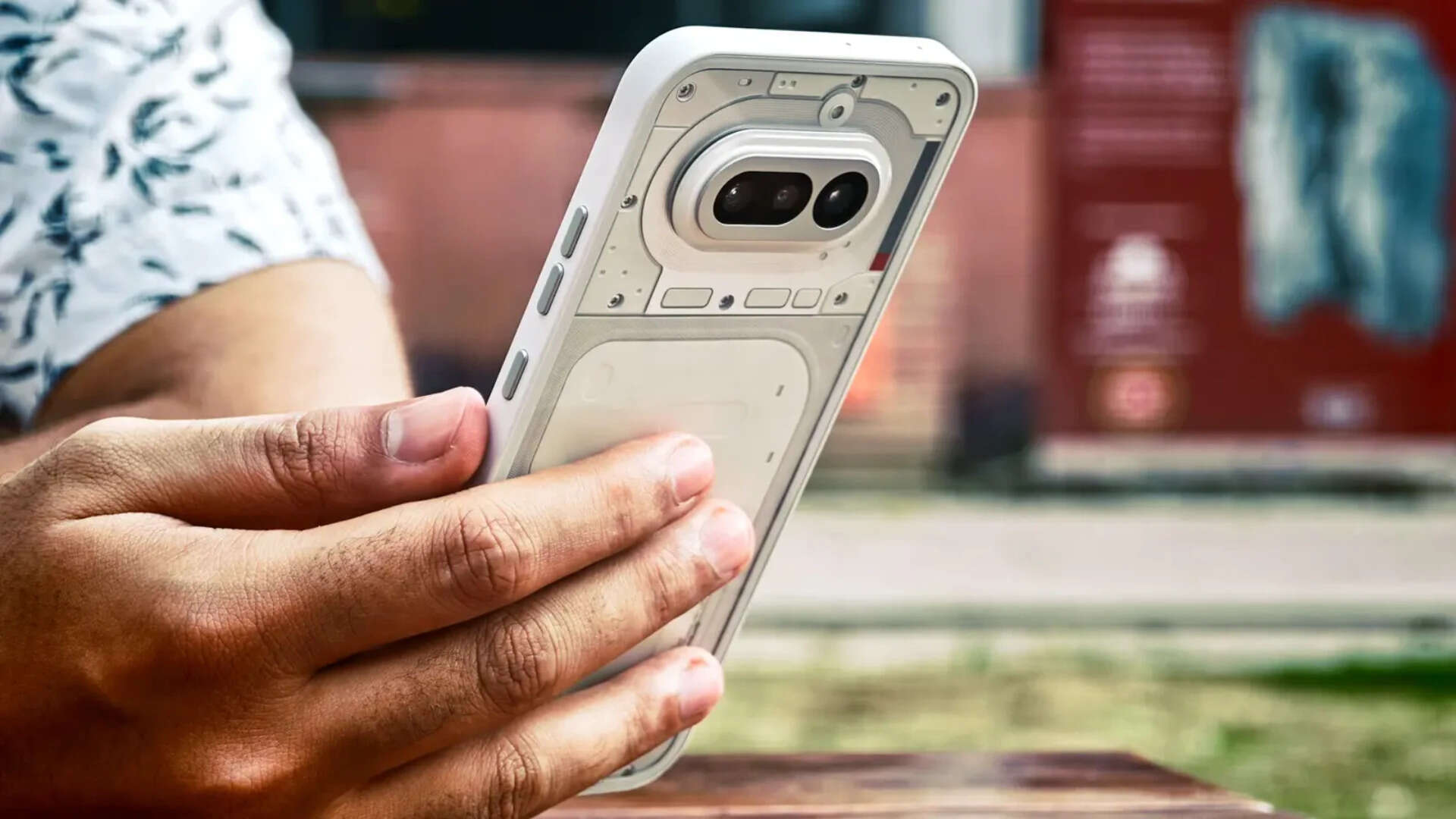 Glass back, polycarbonate frame, IP64. Feels better than the spec sheet suggests.